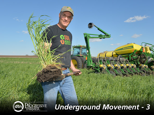 Mark Mueller is digging into the benefits of no-till planting with a cereal rye cover crop. He says it has improved water infiltration. (DTN/Progressive Farmer image by Bob Elbert)